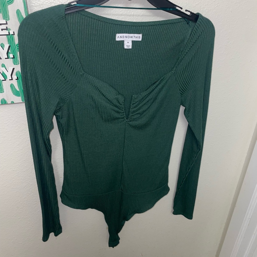 And Now This Green bodysuit